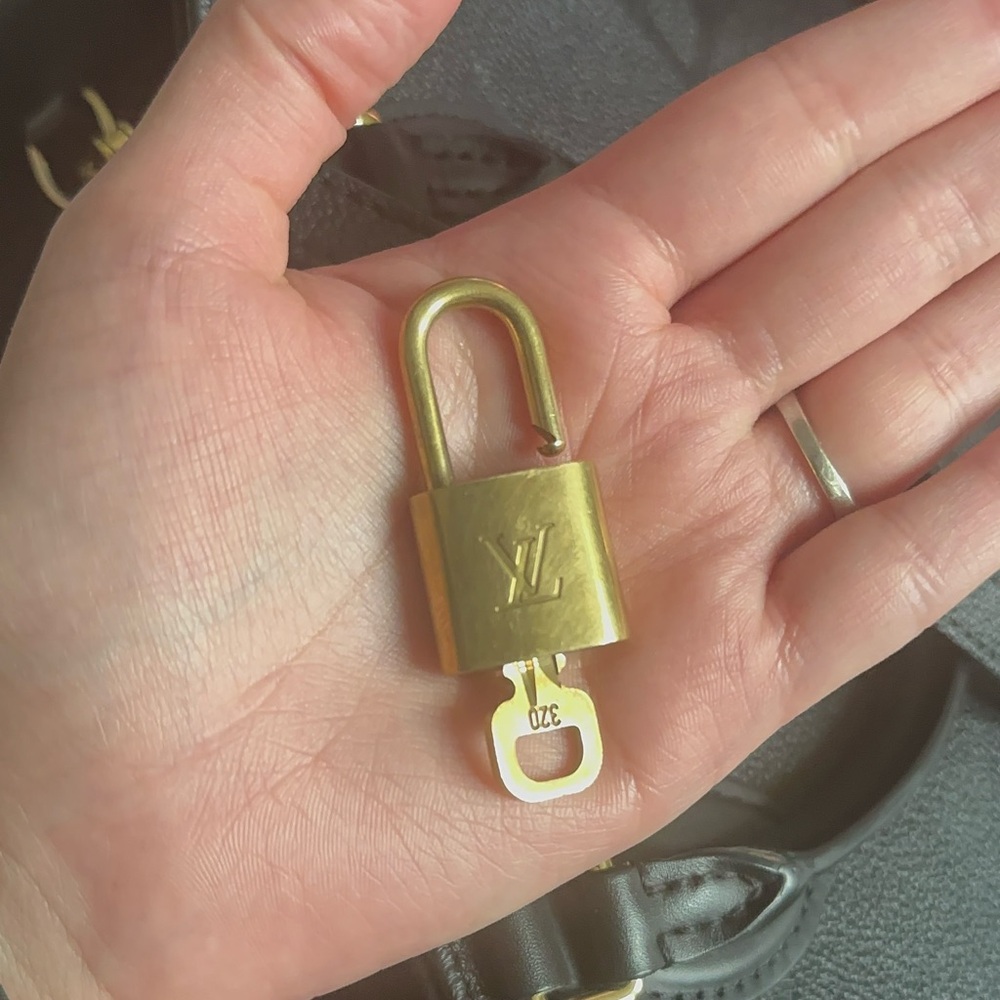 100% authentic LV PadLock & key brass gold